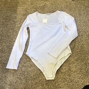 Long sleeve square neck white bodysuit. Size medium.
